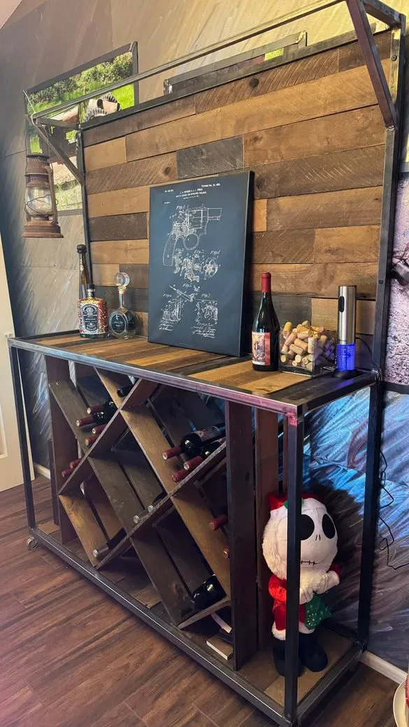 Steel and reclaimed wood bar console with built-in wine rack