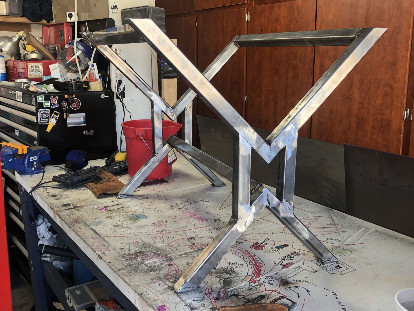 Welding the X-frame legs.